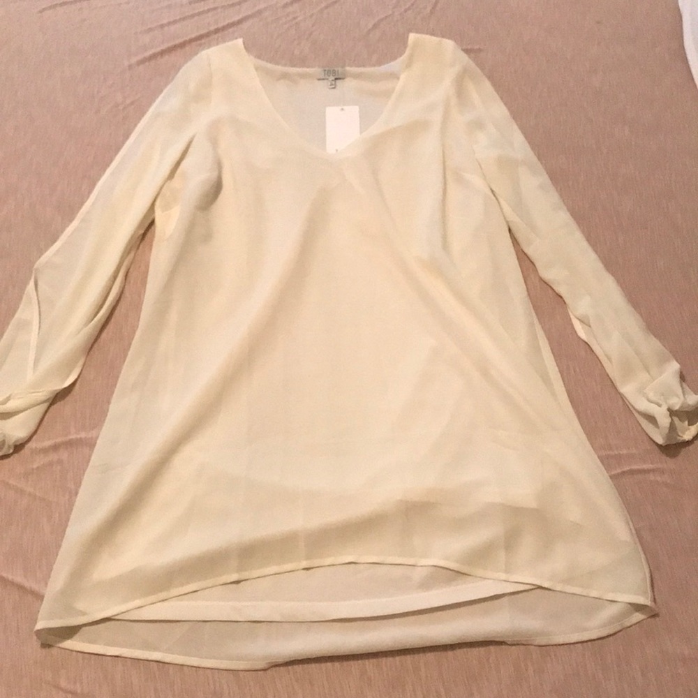 White long sleeved mini dress